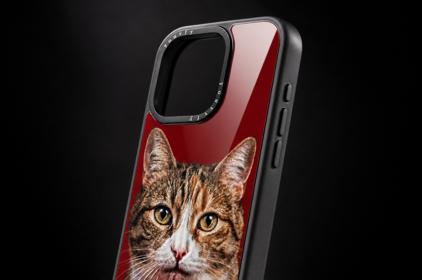 Edge detail of a Youvfy flat-printed iPhone case showing the smooth glossy print surface meeting the black TPU bumper